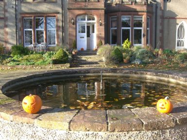 Halloween pumpkins on the fountain at Fleetham Lodge