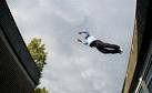 Free-runner negotiates a leap - a 'vault'