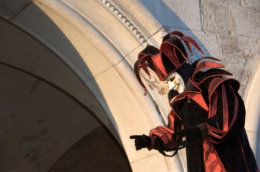 jester by archway in Venice